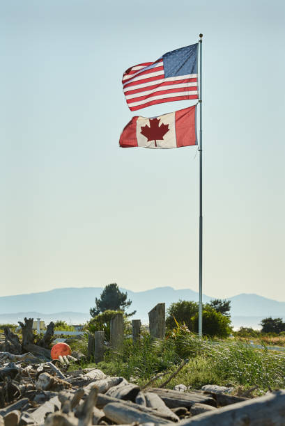 istock US and Canadian Flag 1019644558