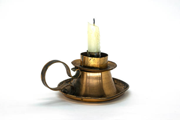 istock Candle Stick on a holder isolated in white background 1019648258
