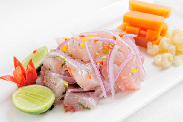 Ceviche, dish symbol of Peruvian gastronomy. Peru. Ceviche, dish symbol of Peruvian gastronomy. On a white background. seviche photos stock pictures, royalty-free photos & images