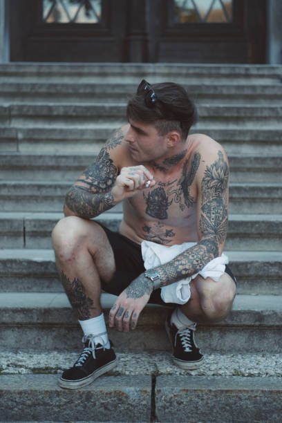 istock Young tattooed man on the street 1019650970