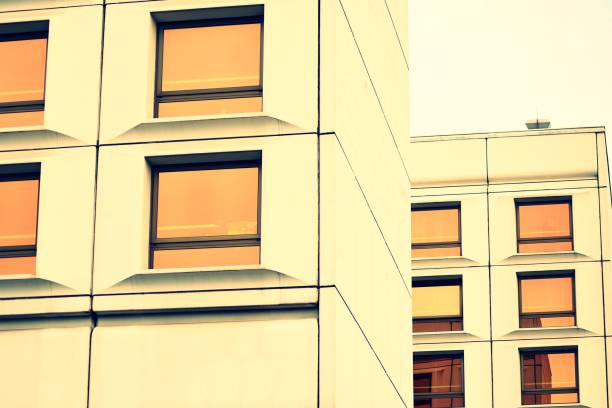 istock Abstract minimal style architecture background. Modern building facade detail. Retro colors stylization 1019659020