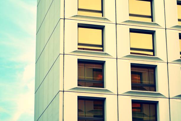 istock Abstract minimal style architecture background. Modern building facade detail. Retro colors stylization 1019663976