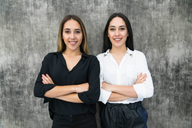 istock twin businesswomen 1019679700