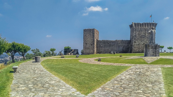 Castelo de Ourém (Castle Ourem), Santarém, Portugal - comprising of a hilltop  village, a 15th century palace (Castle Ourem) and a 12th century castle (Abdegas). This image is of the statue of D Nuno Alvares Pereira and Abdegas.