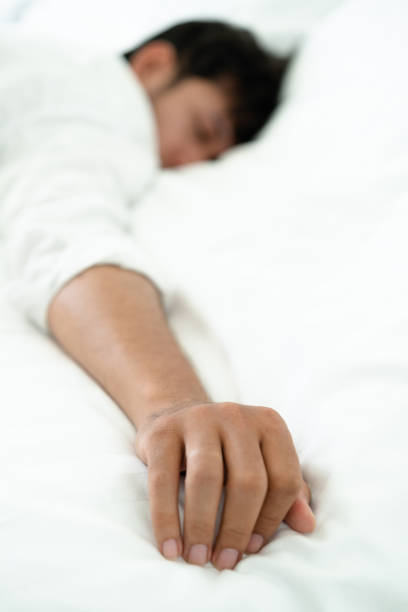 istock Young man sleep in bed in the bedroom. 1019716228