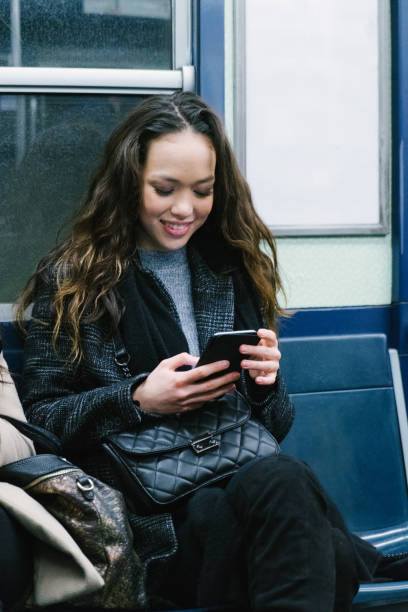 istock Young businesswoman on public transport 1019723802