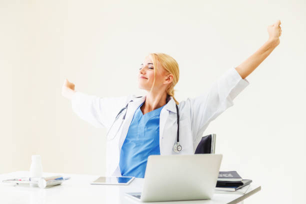 istock Relaxed doctor taking a break in hospital office. 1019724028