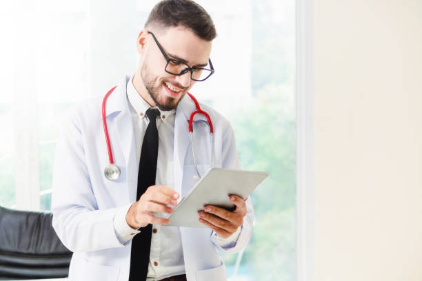 istock Doctor working on tablet computer in the hospital. 1019724118