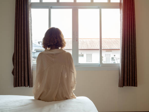istock Woman and the bed 1019735024