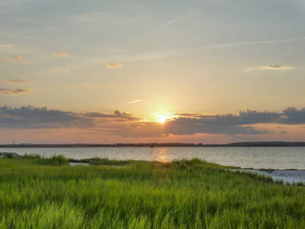 istock Barrier Island Saltwater Marsh  and a Spectacular Sunset 1019765022