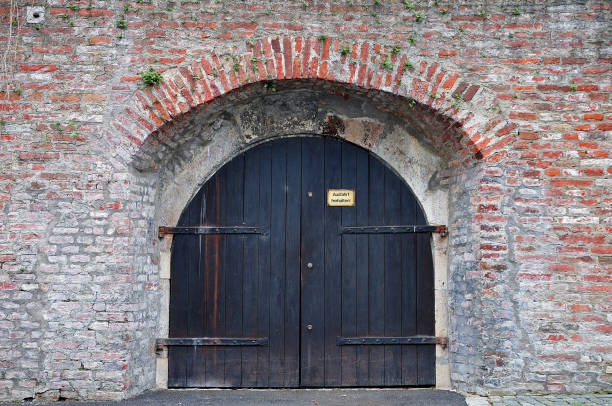 istock old wooden gate in city wall 1019765256
