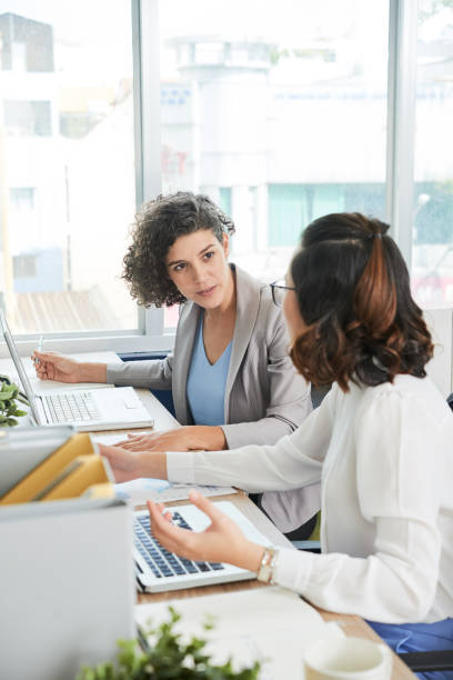 istock Entrepreneurs calling to colleague 1019773140