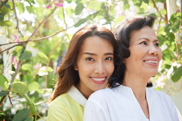 istock Mother and daughter in garden 1019775360