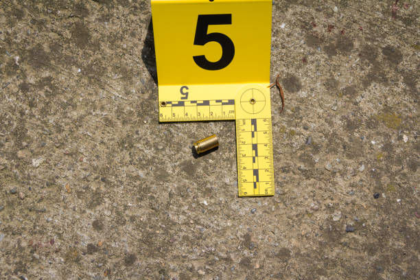 Crime scene investigation Bullet shell marker on the ground instrument of measurement photos stock pictures, royalty-free photos & images