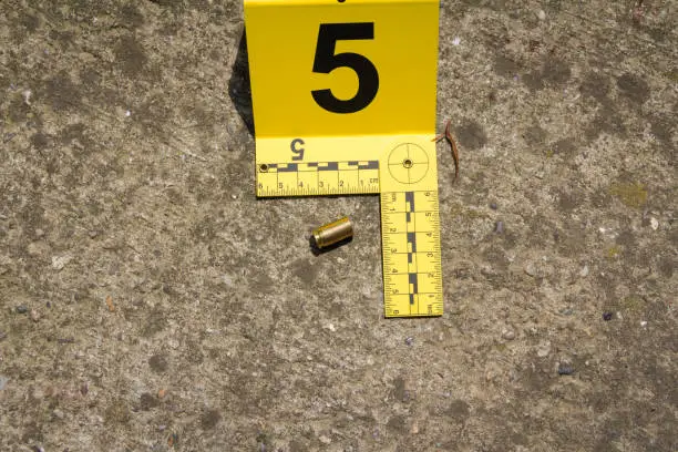 Bullet shell marker on the ground