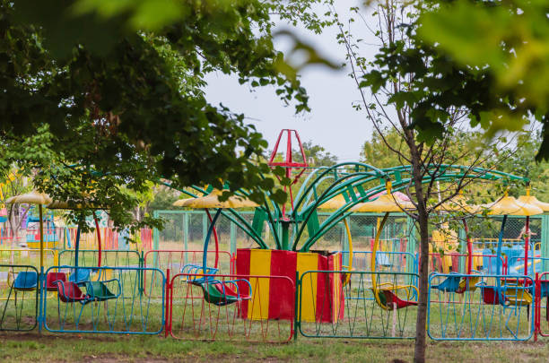istock Lonely park with a swing bored for children 1019817322
