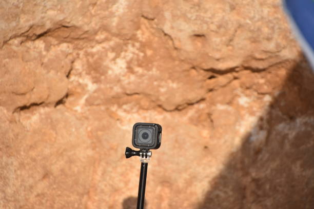istock Extreme camera on tripod against rocks 1019823204