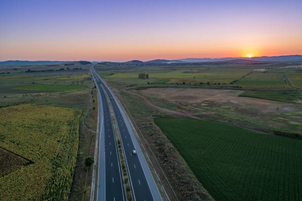 istock Beautiful sunset on Trakia highway in Bulgaria aerial view 1019832112