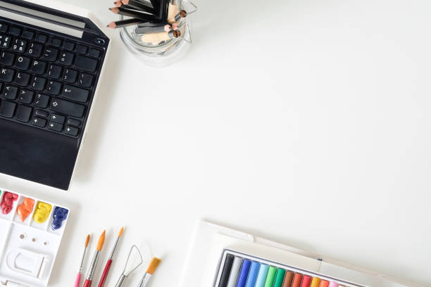 istock Top view office desk with artist table. 1019839386