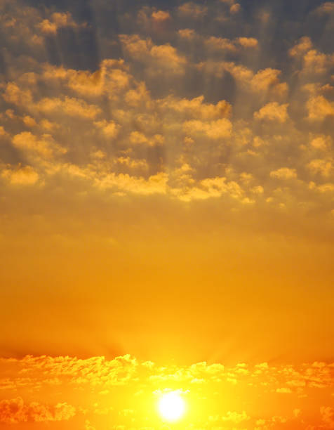 istock Cloudy sky and bright sunrise over the horizon. 1019842732