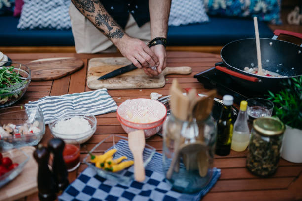 Chef cleaning chopping board