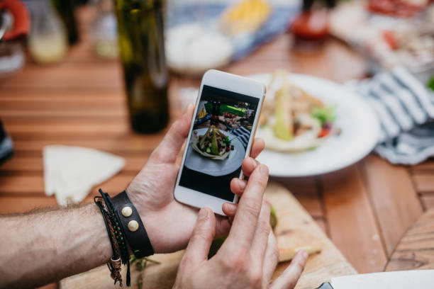 istock Chef taking photos of his food 1019854490