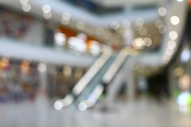 istock Bokeh mall blurred light background. Blurred big super market interior. 1019855048