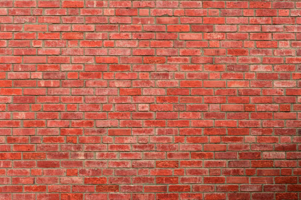 istock Red brick wall texture background. Background for text. Exterior architecture concept. 1019855560