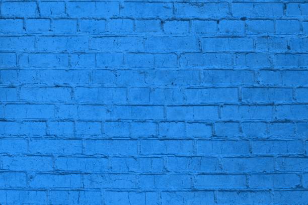 istock blue blank design pattern of painted brick wall that can be used as texture or background 1019858344