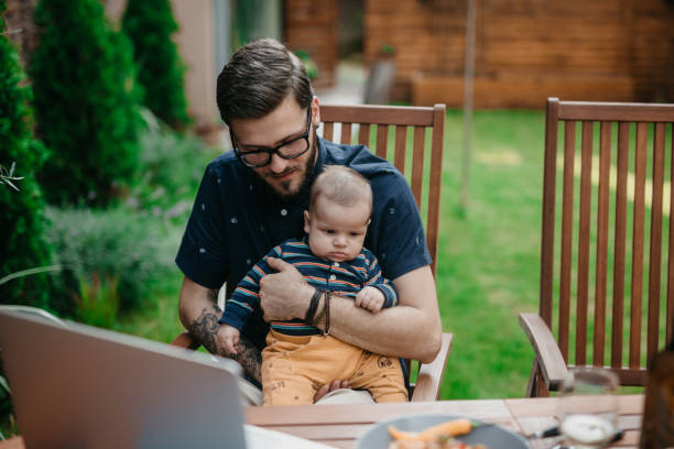 istock Happy father embracing his baby boy 1019858524