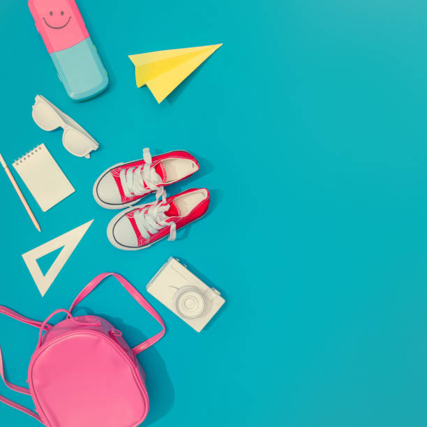 istock Creative layout of school supplies against pastel blue background. 1019858670