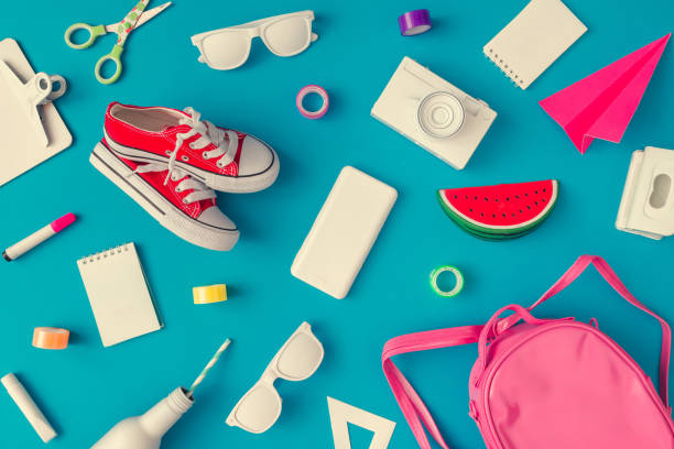 istock Creative layout of school supplies against pastel blue background. 1019858762