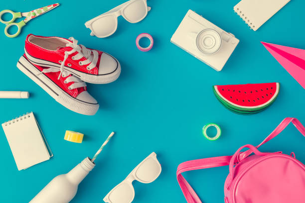 istock Creative layout of school supplies against pastel blue background. 1019858782