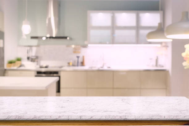 istock Marble counter top table with modern kitchen room background. for products display montage. 1019859186