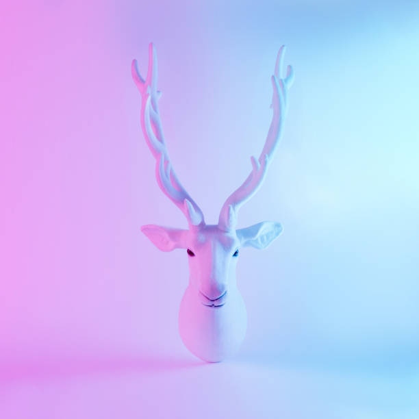istock White Santa's reindeer in vivid gradient neon colors. 1019859264