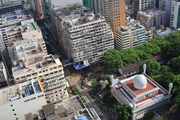 istock Chinese-style building and mosque tower in Kowloon 1019859496