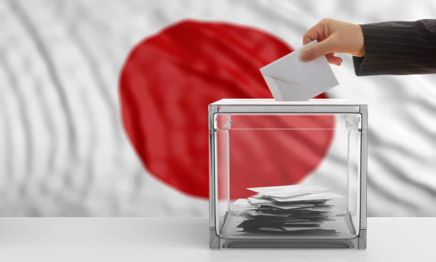 istock Voter on a Japan flag background. 3d illustration 1019876350