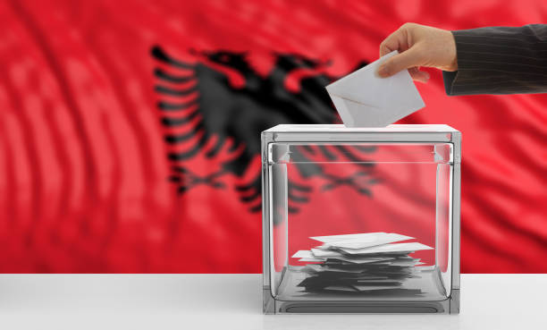 istock Voter on an Albanian flag background. 3d illustration 1019876440
