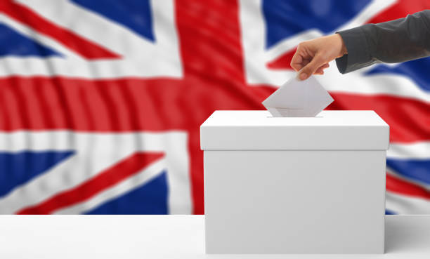 istock Voter on an UK flag background. 3d illustration 1019886460