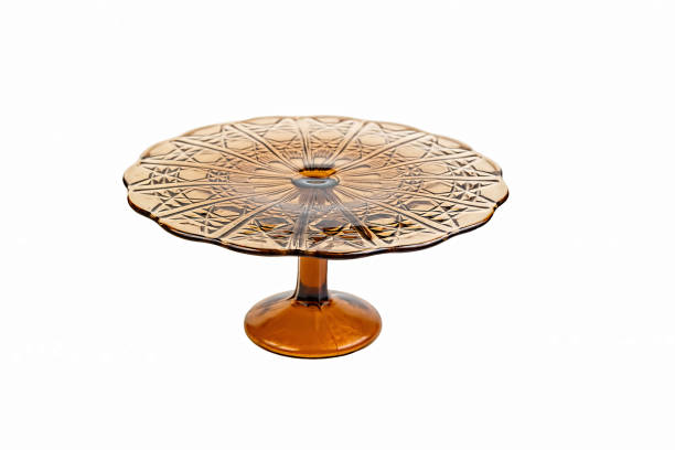 Glass cake stand in brown color isolated