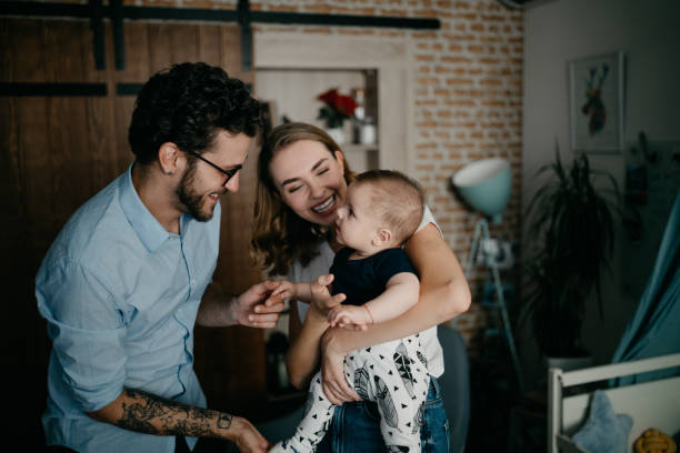 istock Parents embracing their baby boy 1019889274