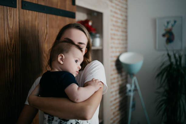 istock Mother embracing her little baby boy 1019889628