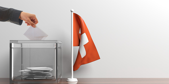 Glass ballot box and a small Switzerland flag. 3d illustration