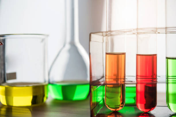 istock Laboratory glassware containing colorful chemical liquid, lab research and development concept 1019892436