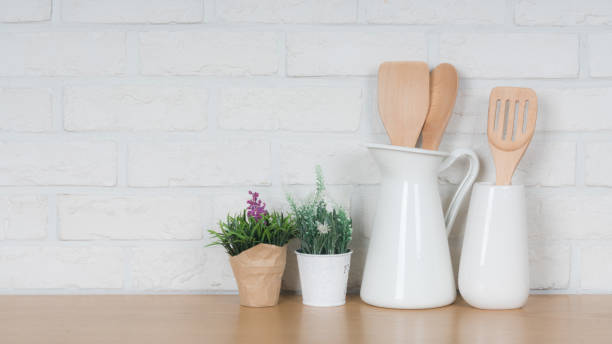 istock Kitchen utensils and dishware on wooden shelf. Kitchen interior background.Text space. 1019894962