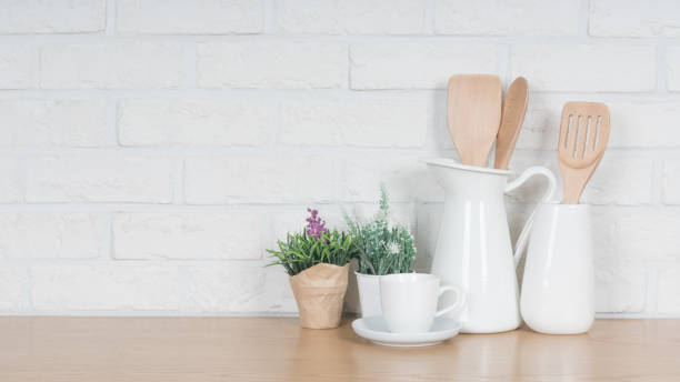 istock Kitchen utensils and dishware on wooden shelf. Kitchen interior background.Text space. 1019895006