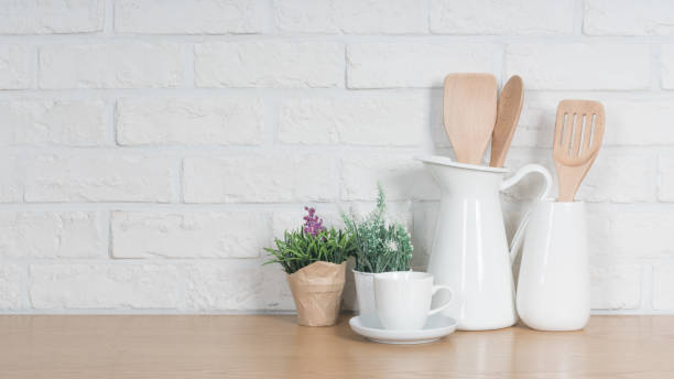 istock Kitchen utensils and dishware on wooden shelf. Kitchen interior background.Text space. 1019895018