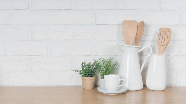 istock Kitchen utensils and dishware on wooden shelf. Kitchen interior background.Text space. 1019895038