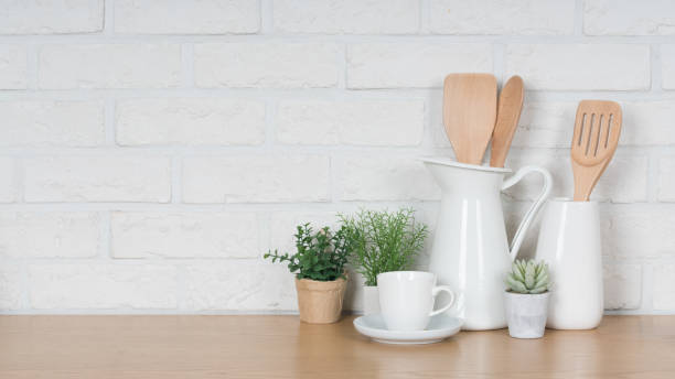 istock Kitchen utensils and dishware on wooden shelf. Kitchen interior background.Text space. 1019895040