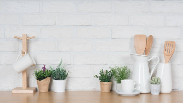 istock Kitchen utensils and dishware on wooden shelf. Kitchen interior background.Text space. 1019895088